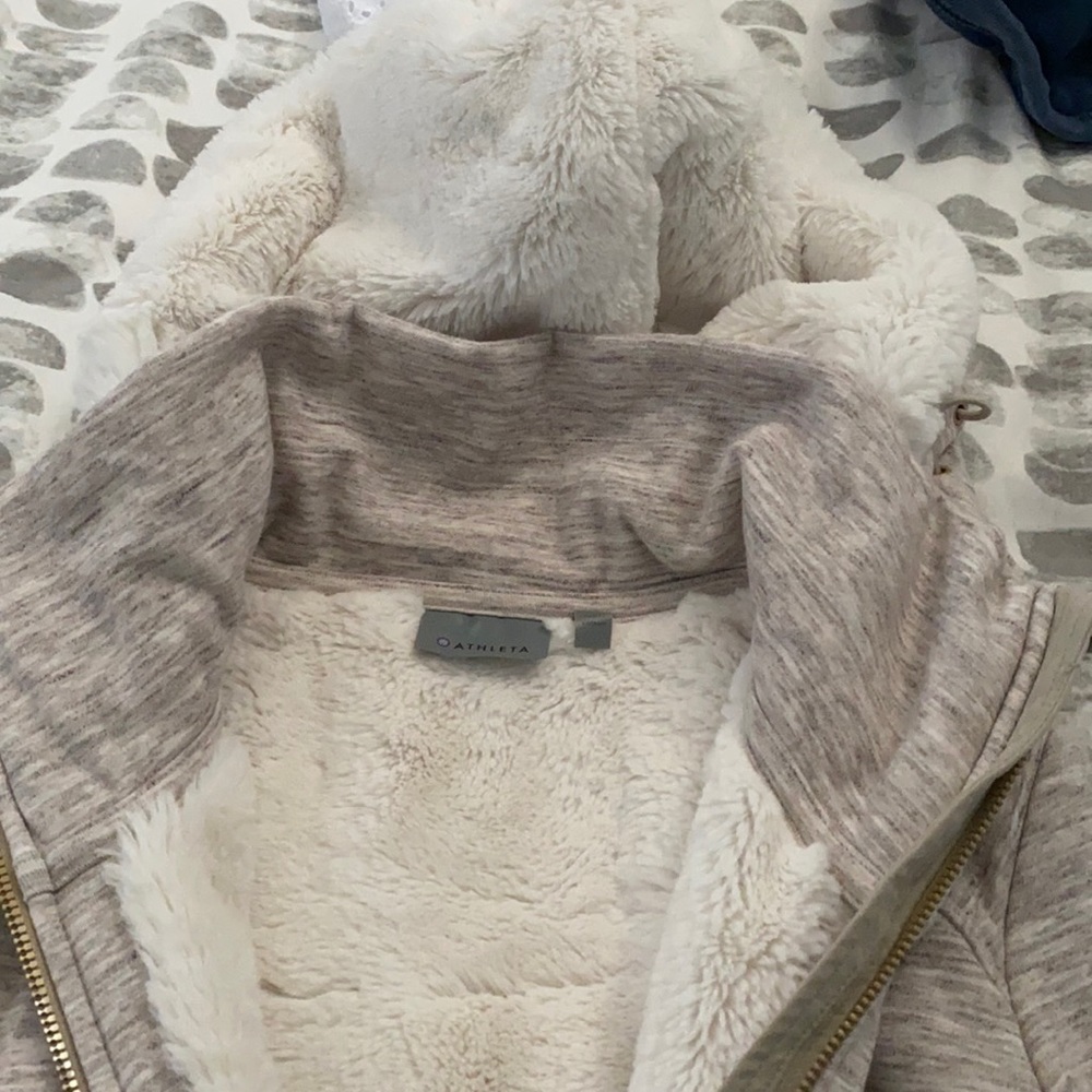 Fuzzy Athleta hoodie with gold accents!